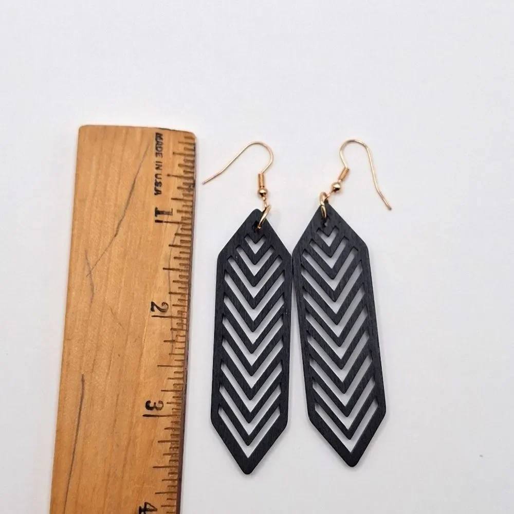 Black wood hollowed out earrings abstract